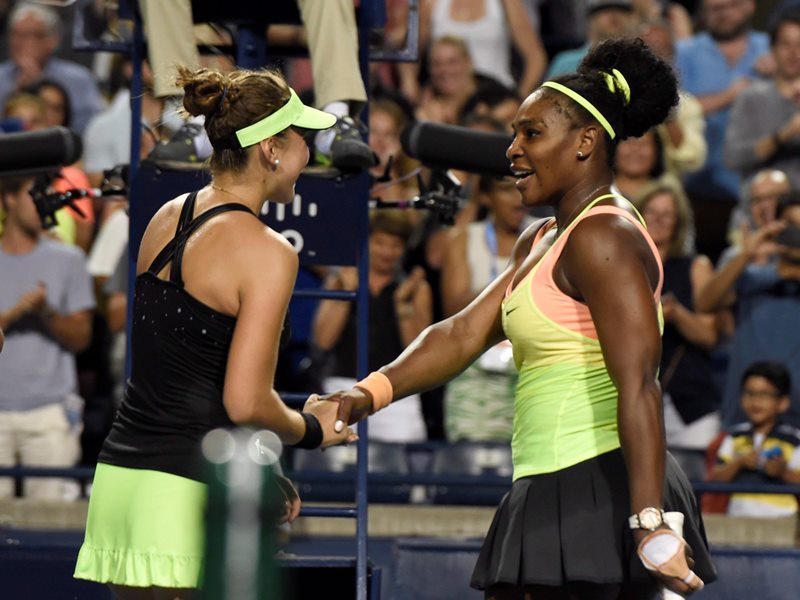 Belinda Bencic, right, of Switzerland, is congratulated by Serena Williams after she defeated Williams, of the United States, during Rogers Cup semi-final tennis action in Toronto on Saturday, August 15, 2015.