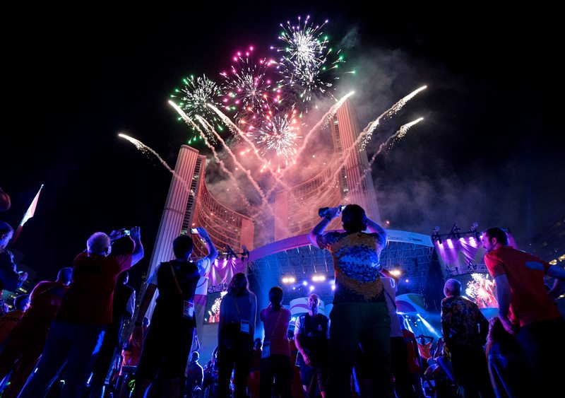 Athletes watch a fireworks display during the closing ceremony of the Parapan Am Games in Toronto on Saturday, August 15, 2015.