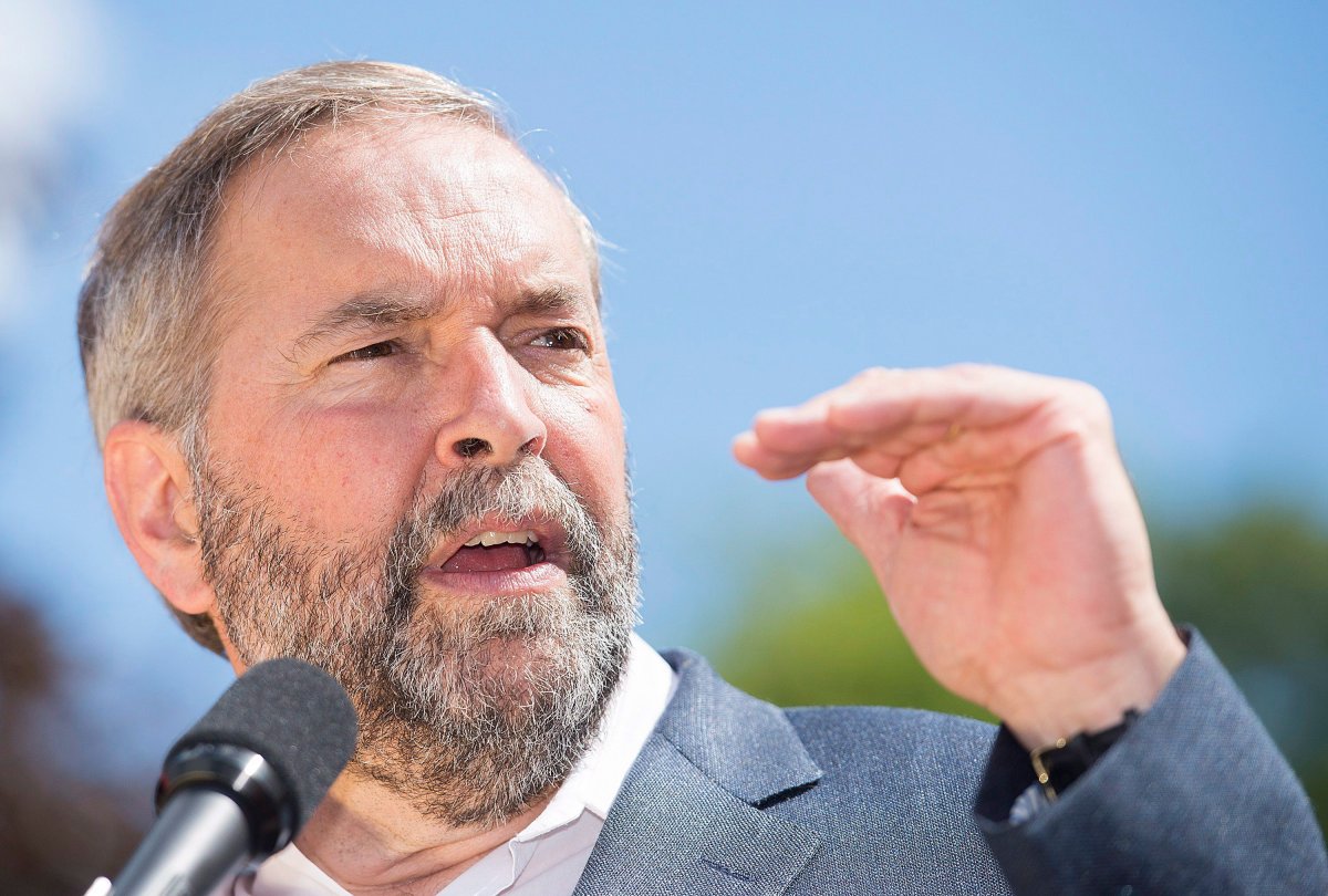 NDP Leader Thomas Mulcair speaks to supporters during a federal election campaign stop in Saint Jerome, Que., on Saturday, August 22, 2015.