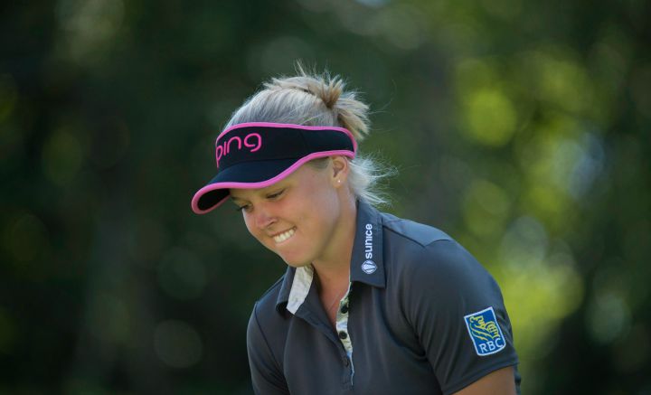 Brooke Henderson, of Smiths Falls, Ont., smiles as she prepares to tee off on the 18th hole at the Canadian Pacific Women's Open LPGA golf tournament at the Vancouver Golf Club in Coquitlam, B.C., on Saturday, August 22, 2015. 