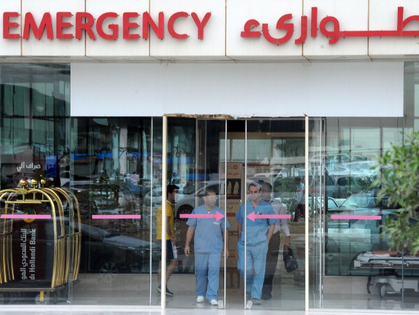 Medical workers leave the hospital's emergency department on April 27, 2014 in the Saudi capital Riyadh. 