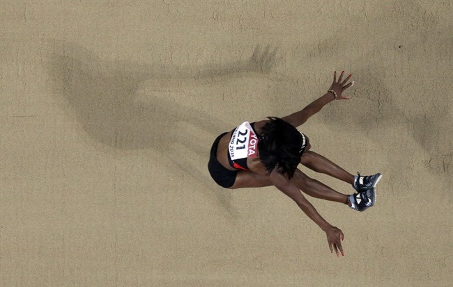 Canada's Christabel Nettey competes in the women's long jump final at the World Athletics Championships at the Bird's Nest stadium in Beijing, Friday, Aug. 28, 2015.