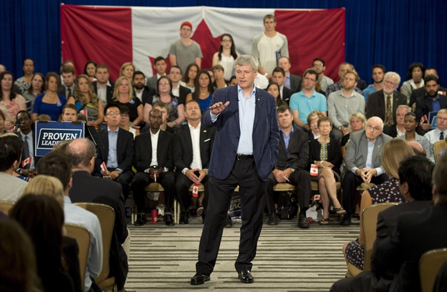 Conservative leader Stephen Harper speaks to supporters during a campaign stop in Ottawa, Monday, August 31, 2015.