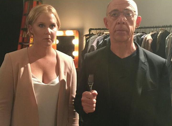 Amy Schumer and J.K. Simmons recreate Grant Wood's American Gothic painting.