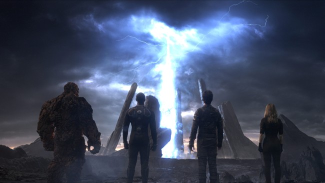 This photo provided by 20th Century Fox shows The Thing, from left, Michael B. Jordan as Johnny Storm, Miles Teller as Dr. Reed Richards, and Kate Mara as Sue Storm, in a scene from the film "Fantastic Four.".