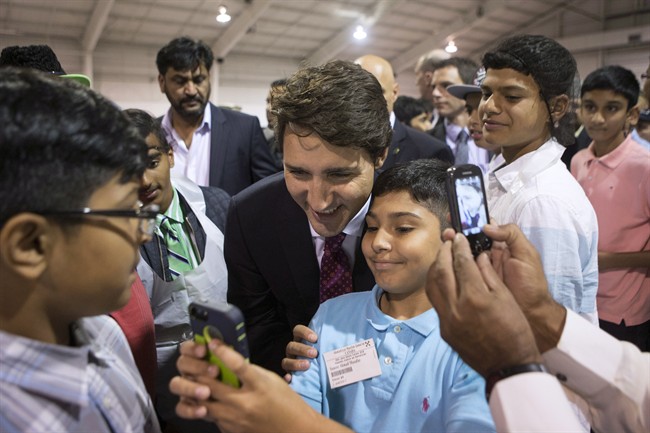 Then Liberal leader Justin Trudeau poses for a selfie on the campaign trail on Saturday, August 28, 2015.