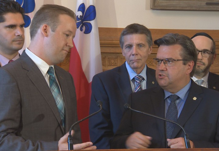 City councillor Marc-André Gadoury and Montreal Mayor Denis Coderre at a press conference on Thursday, August 6, 2015.