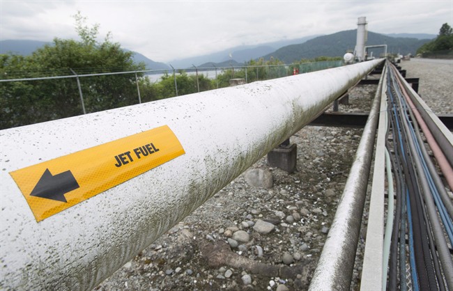 A pipeline is pictured at the Kinder Morgan Trans Mountain Expansion Project in Burnaby, B.C., on June 4, 2015. Trans Mountain has filed its final arguments to the National Energy Board, saying its pipeline expansion would increase Canada's gross domestic product by $18.2 billion during the first 20 years of operation. THE CANADIAN PRESS/Jonathan Hayward.