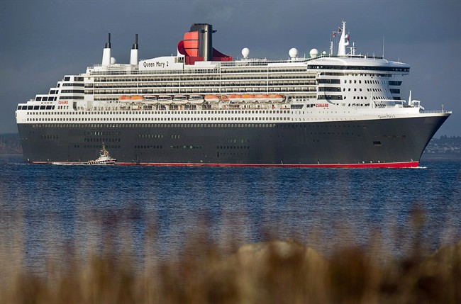 FILE -- The transatlantic ocean liner Queen Mary II sails from Halifax harbour near Portugese Cove, N.S. on Sunday, Oct.20, 2013.