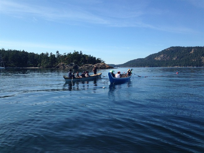 First Nations fishermen are shown setting a reef net in this undated handout photo. Almost a century after fishing practices unique to First Nations in British Columbia's Salish Sea were outlawed, members paddled canoes back to traditional waters and dropped their full-sized reef net. It was the start of a long-term mission to revitalize the once-celebrated technique for gathering food and bonding community for the Strait Salish people.