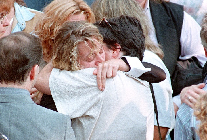In this file photo, the mother of car bomb victim Daniel Desrochers is comforted by a family member during Daniel's funeral  on Thursday Aug. 17, 1995.