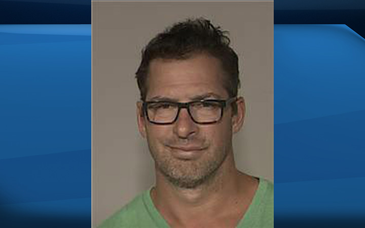 The booking photo made available by the Anoka County Sheriff's office of Minnesota Wild NHL assistant coach Darryl Sydor.