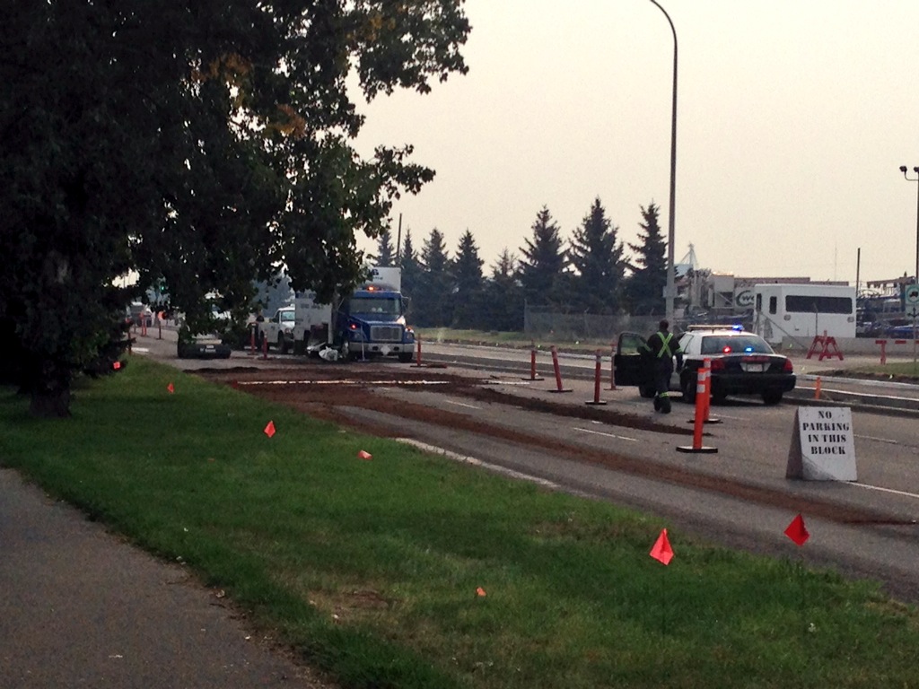 crews work to clean up a diesel spill on 5th Ave. N.