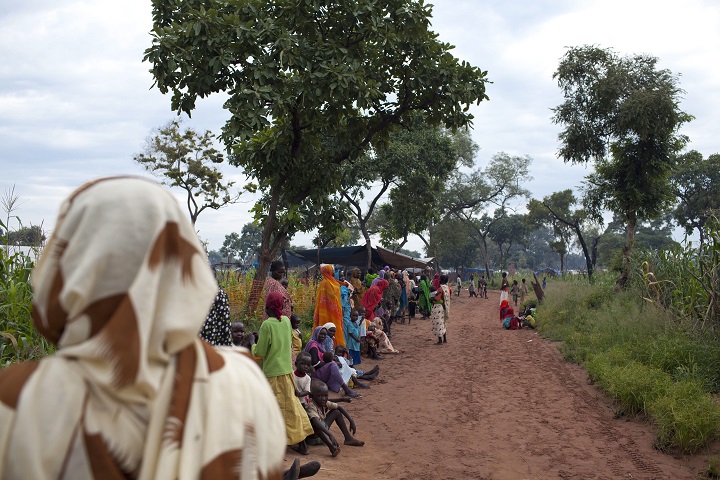 Mothers and children wait in line at a Medecins Sans Frontieres (Doctors Without Borders) Outpatient Therapeutic Program screening center in South Sudan in this September 2012 file photo. 