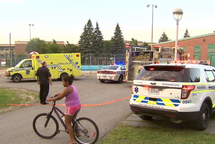 First responders on the scene of a near drowning in Saint-Michel, Thursday, August 20, 2015.