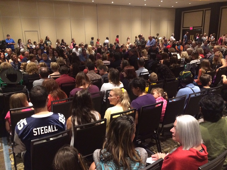 Extras eagerly await their turn in open casting call for Dennis Quaid film