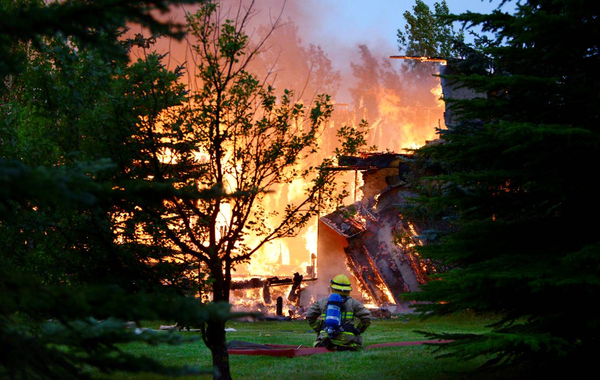House burns to the ground on acreage west of Calgary, reports of an explosion - image
