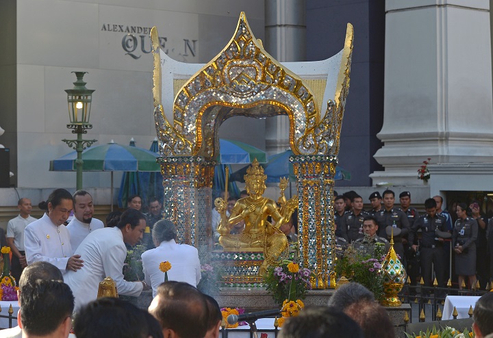 A religious ceremony takes place on the Brahma statue at the Erawan shrine - the popular tourist site where 20 people were killed on August 17 - in central Bangkok on August 21, 2015.  Thai authorities said on August 20 international terror groups were likely not behind the deadly Bangkok shrine bombing which killed 20 people, as the suspected foreign bomber remained at large and two possible accomplices were all but ruled out.       