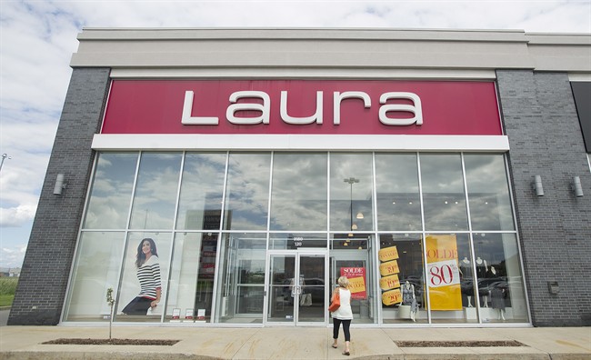 A woman walks into a Laura clothing store in Vaudreuil-Dorion, west of Montreal.