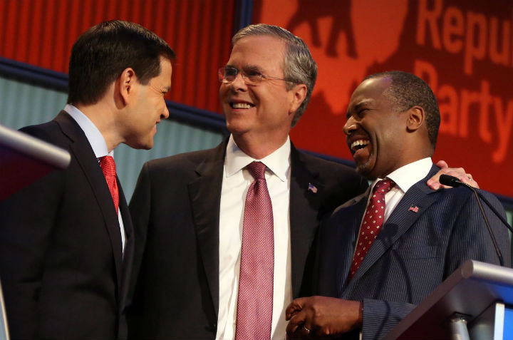 Republican presidential candidates from left, Marco Rubio, Jeb Bush and Ben Carson talk during a break during the first Republican presidential debate at the Quicken Loans Arena Thursday, Aug. 6, 2015, in Cleveland. 