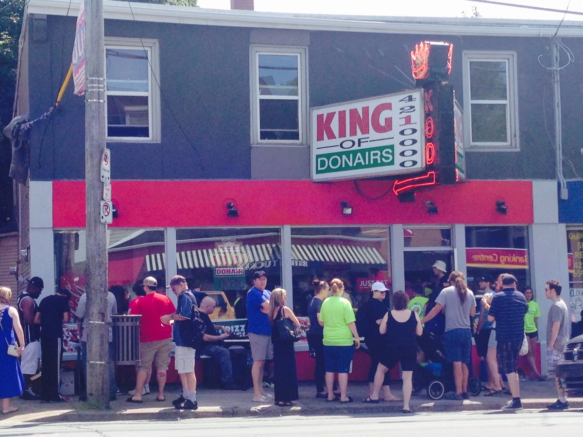 People line up for the first stop on the Halifax donair crawl well before it even starts.