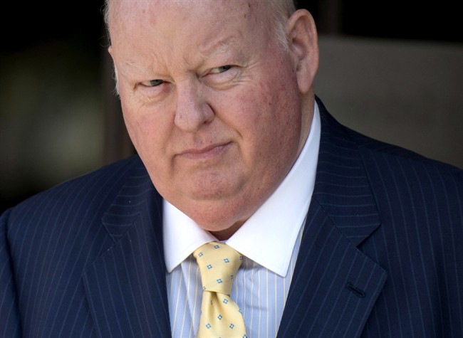 Former Conservative Senator Mike Duffy leaves the courthouse in Ottawa Aug. 19.