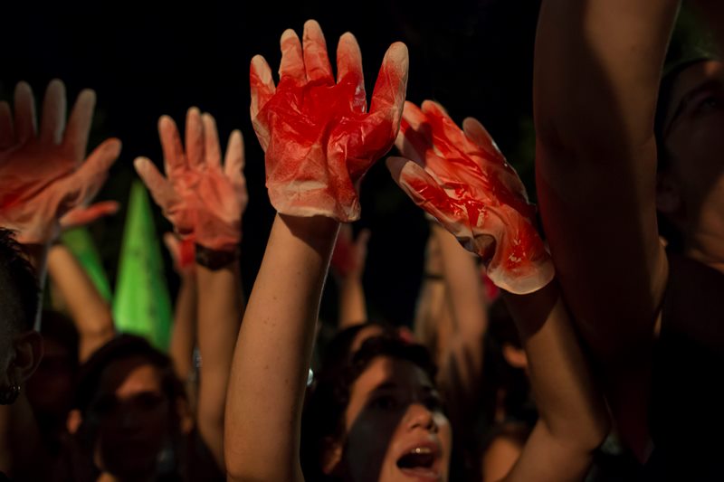 Israeli members of the gay community and supporters rally, calling for a stop to the the violence in Tel Aviv, Israel, Saturday, Aug. 1, 2015. 