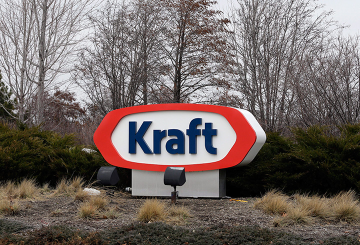 The Kraft logo appears outside of the headquarters on Wednesday, March 25, 2015 in Northfield, Ill. Kraft Heinz says it is cutting about 2,500 jobs as part of its plan to slash costs after the food companies combined. 