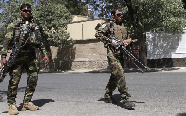 Afghanistan's National Army soldiers patrol in Herat, west of Kabul, Afghanistan, Wednesday, Aug. 12, 2015.