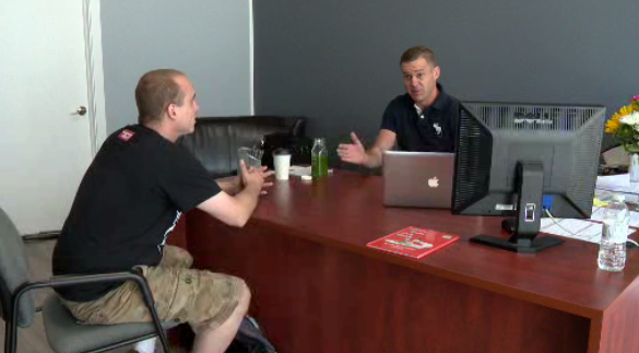 Mark Hauk consulting with new member of Saskatchewan Compassion Club.