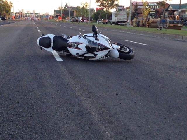 Edmonton's Gateway Boulevard at 39th Ave. was closed Monday morning after a motorcycle crash sent the driver to hospital with serious injuries. August 8, 2015.