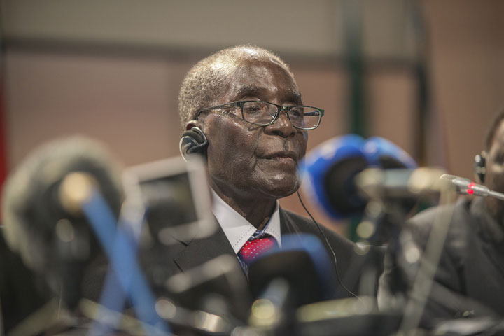 Chairperson of the African Union Summit President Robert Mugabe gives his closing statements at the end of the 25th AU summit held in Sandton Johannesburg South Africa.  