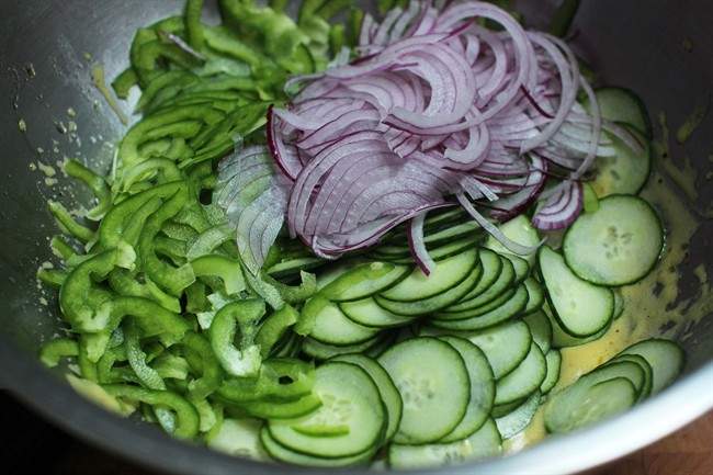 This July 20, 2015 photo shows chili cucumber bread salad in Concord, NH. 