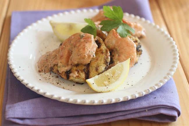 A grilled take on fried green tomatoes with shrimp remoulade