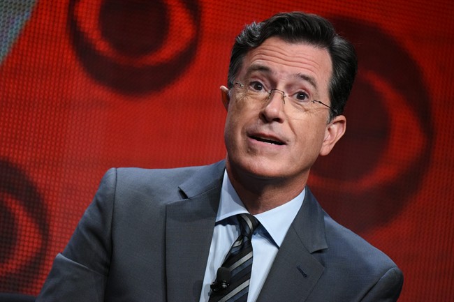 FILE - In this Aug. 10, 2015, file photo, Stephen Colbert participates in "The Late Show with Stephen Colbert" segment of the CBS Summer TCA Tour in Beverly Hills, Calif.