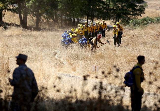 Members of the Oregon National Guard participate in wildland fire training Tuesday, Aug. 25, 2015, in Salem, Ore. 