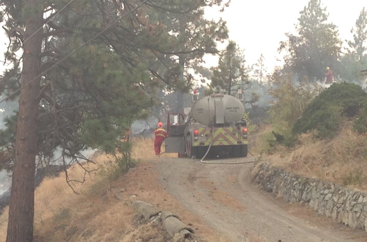Peachland fire gets very close to homes - image