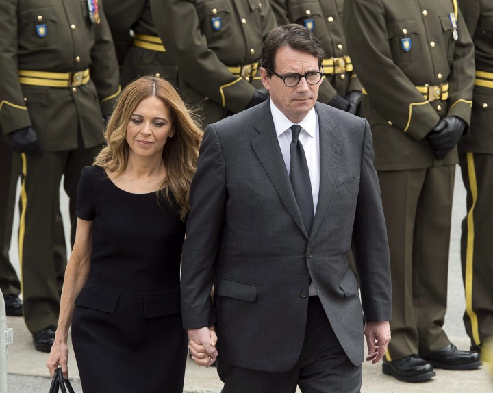 Parti Québécois leader Pierre Karl Péladeau and girlfriend Julie Snyder arrive for funeral services for former Quebec Premier Jacques Parizeau in Montreal, Tuesday, June 9, 2015.