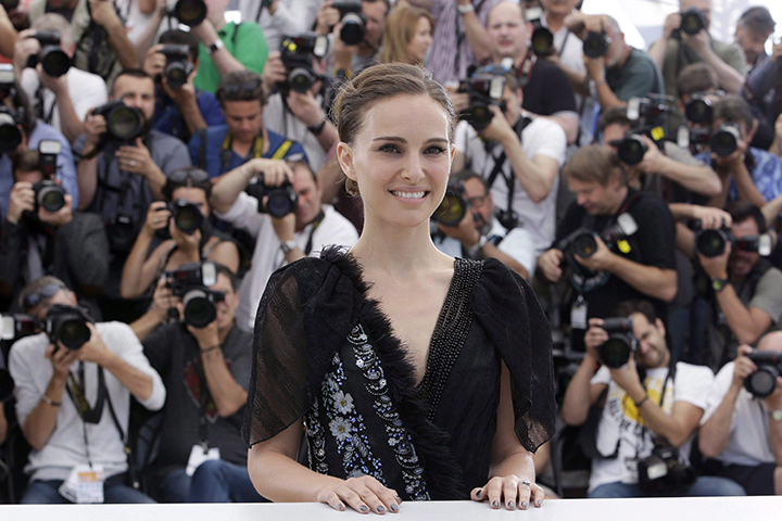 Director and actor Natalie Portman poses for photographers during a photo call for the film A Tale of Love and Darkness, at the 68th international film festival, Cannes, southern France, Sunday, May 17, 2015.