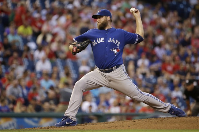 Toronto Blue Jays' Mark Buehrle pitches during the third inning of a baseball game against the Philadelphia Phillies, Wednesday, Aug. 19, 2015, in Philadelphia.