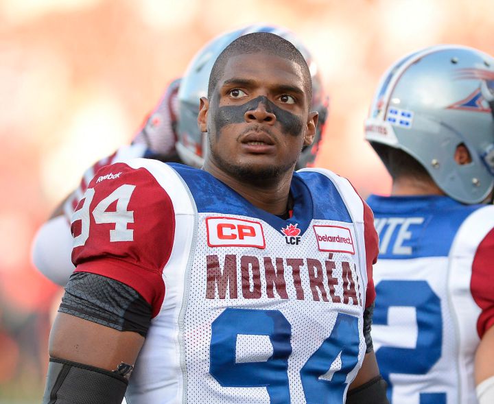 The Montreal Alouettes defensive lineman Michael Sam looks into the crowd before the start of their CFL game against the Ottawa Redblacks in Ottawa on Friday, August 7, 2015. Michael Sam is set to make his pro football debut. 