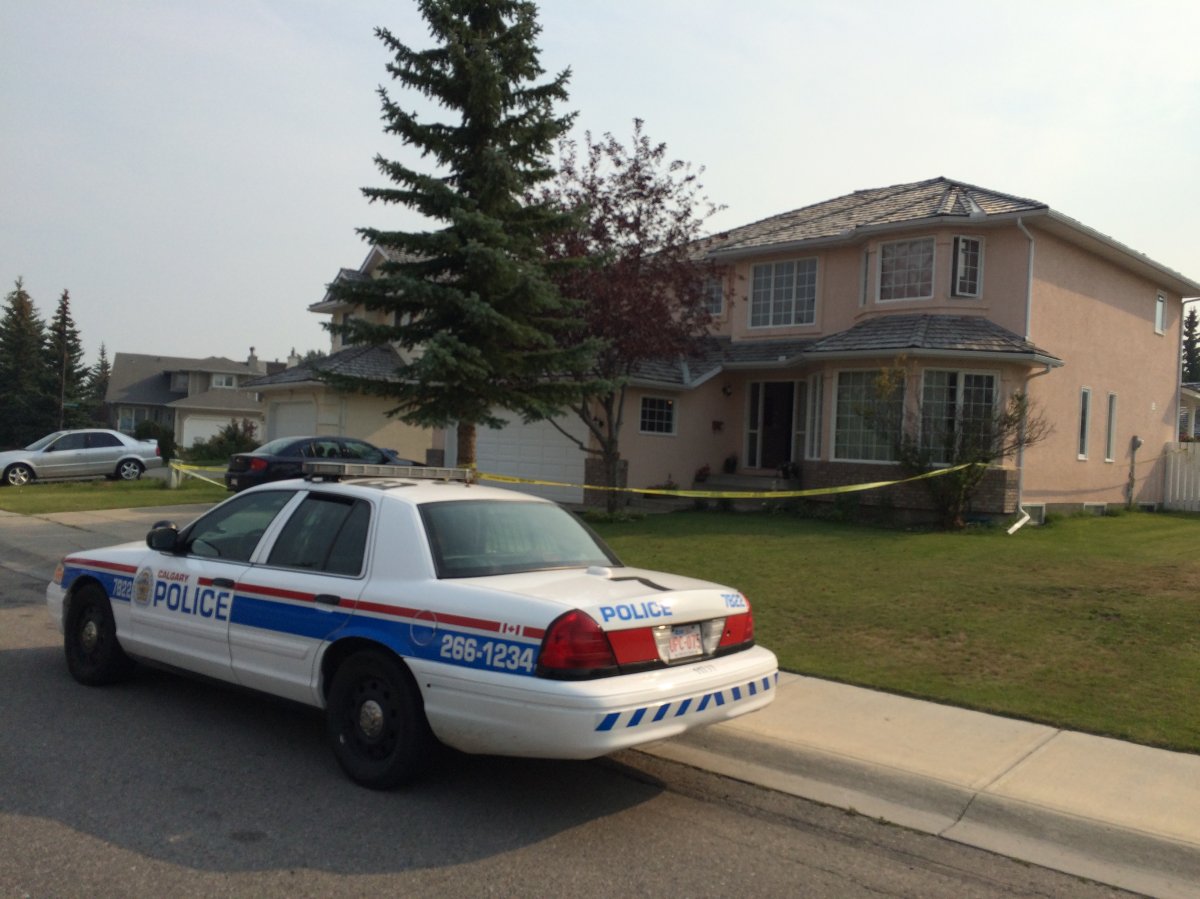 Police tape surrounds a house in the Hawkwood neighbourhood, where an alleged sexual assault occurred involving two young girls. 