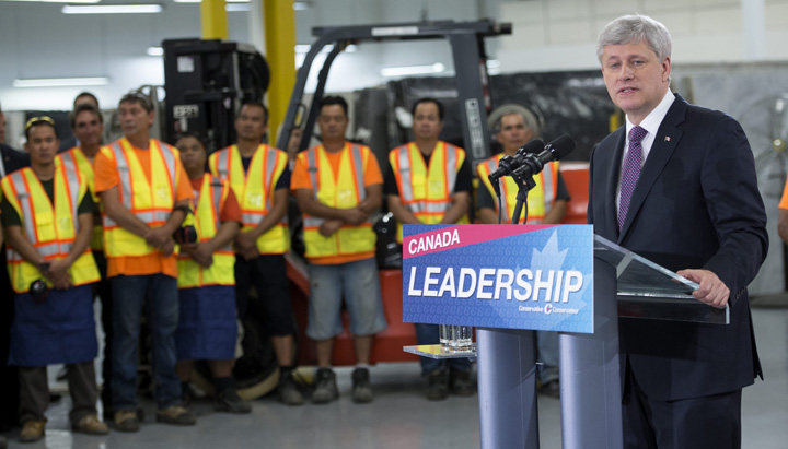 Conservative leader Stephen Harper addresses workers and supporters while touring a ceramic tile and granite distributor Tuesday, August 4, 2015 in Toronto. THE CANADIAN PRESS/Paul Chiasson