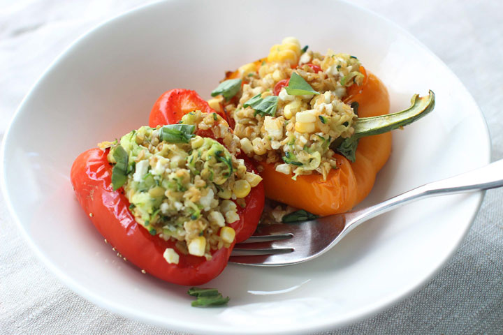 This July 20, 2015 photo shows baked stuffed peppers with freekeh in Concord, NH.