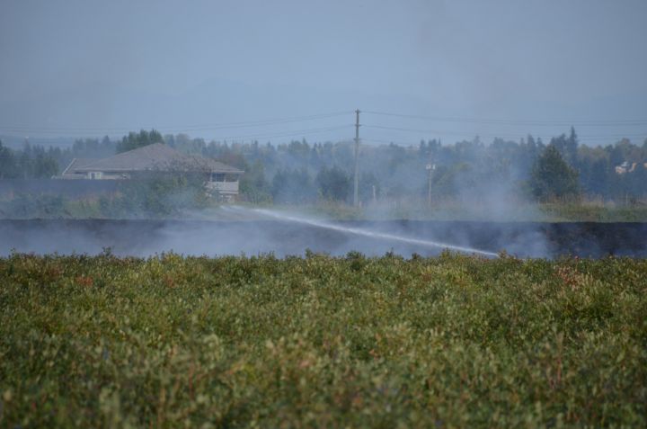 Crews battle a brush fire on Aug. 24, 2015.