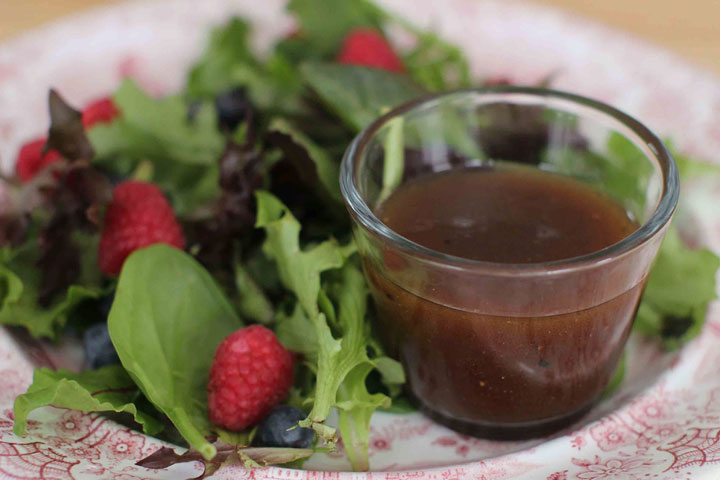 This March 9, 2015 shows a vinaigrette dressing with a salad in Concord, N.H.