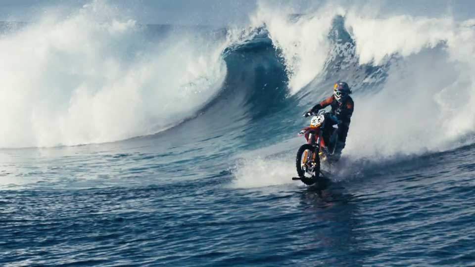 Robbie Maddison rides a Tahitian wave
