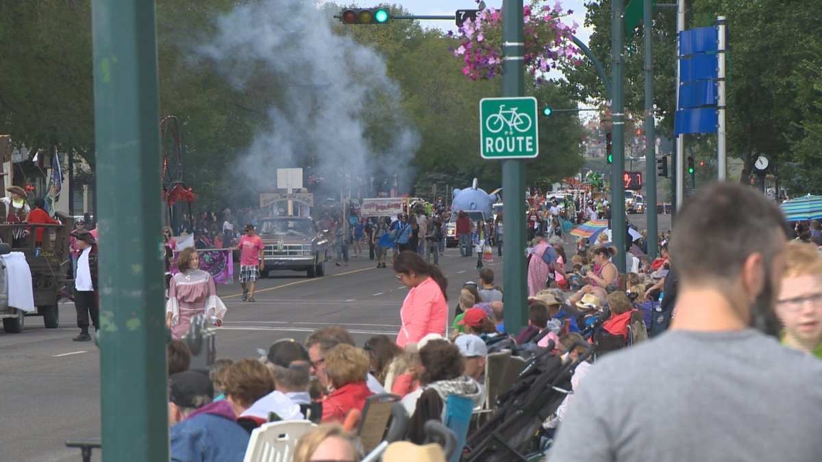 People line the streets to watch the Whoop Up Days Parade in Lethbridge.