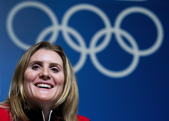 Hayley Wickenheiser smiles during a press conference before the 2014 Sochi Winter Olympics in Sochi, Russia on Wednesday, February 5, 2014. 