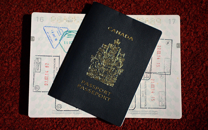 A Canadian Passport is displayed in Ottawa on Thursday, July 23, 2015.